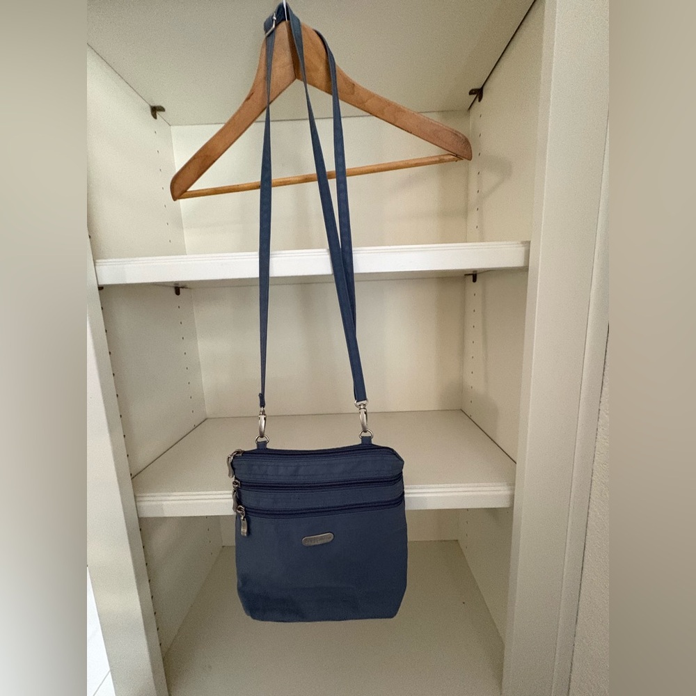 Baggallini blue crossbody bag adjustable strap zipper accents green lining